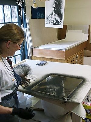 Janet inks the plate