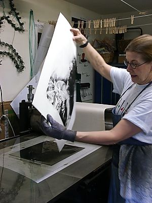 Janet inspects the print